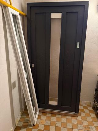 Vchodové dveře levé , nové.Profil Kömmerling 6 komor.