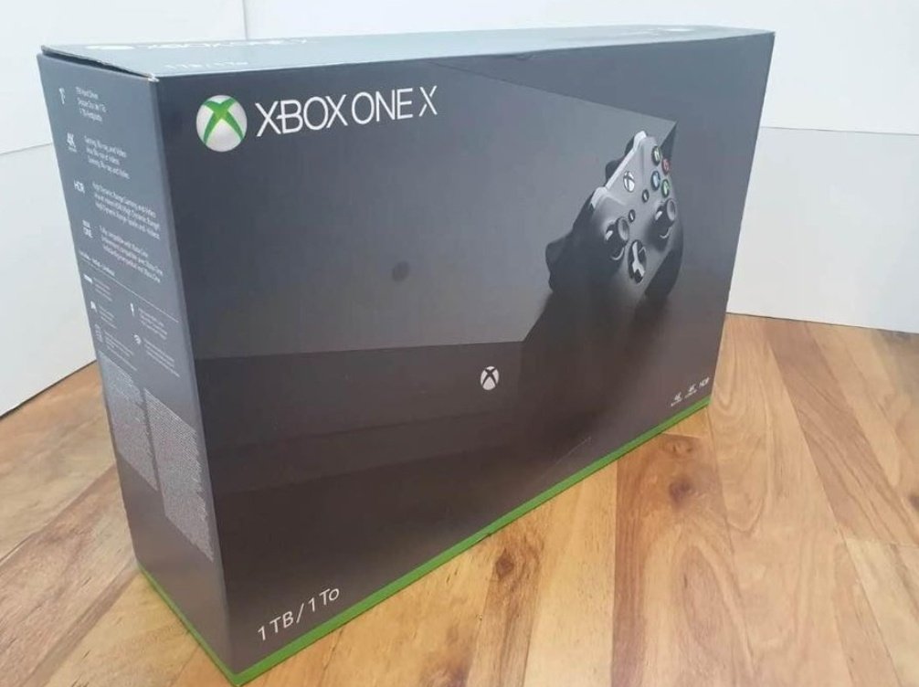 Xbox One X 1TB + hry