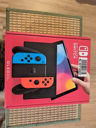Nintendo SWITCH OLED + 2 hry, nejlepší cena
